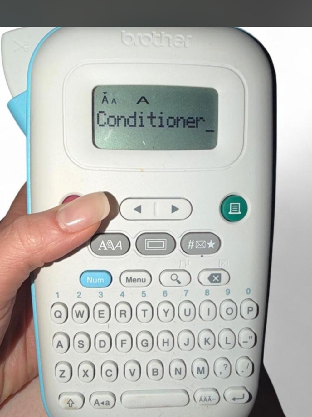 Brother Portable Label Maker in White with Teal Accents